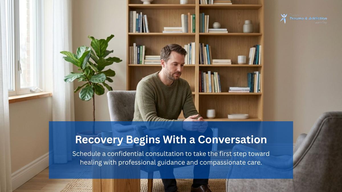  Individual speaking with a therapist in a private counselling office about sexual addiction recovery and confidential support.